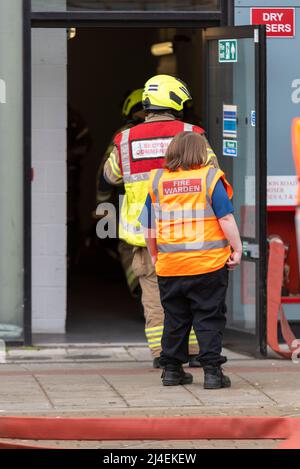 Essex County Fire & Rescue Service carrying out training exercise at the University of Essex student accommodation, Southend. Fire Warden and firemen Stock Photo