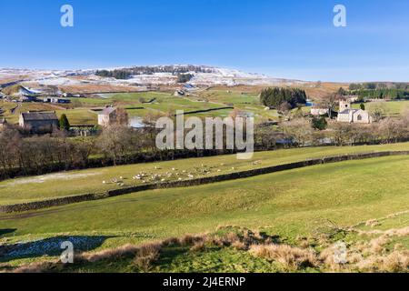 Langthwaite, Arkengarthdale, Yorkshire Dales National Park. Snow covers the hilltops in late February.