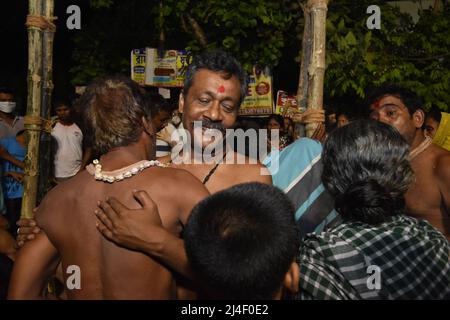 West Bengal, India. 14th Apr 2022. Howrah, West Bengal, India. 14th Apr, 2022. The Hindu festival Gajan or Shivagajan is being celebrated with various rituals mainly in Bengal. It is associated with Lord Shiva, Neel and Dharmaraj in Hinduism. Gajan spans several days in the month of Chaitra and continuing till the end of the Bengali year and ends with Charak puja. Participants known as Sannyasi or Bhakta belong to any gender and age. The main theme of this festival is deriving satisfaction through pain, devotion and sacrifice. Credit: ZUMA Press, Inc./Alamy Live News Stock Photo