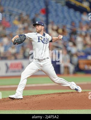 Tampa Bay Rays pitcher Jeffrey Springs winds up to throw from the mound ...