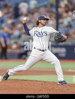 Tampa Bay Rays pitcher Phoenix Sanders, left, throws to first base