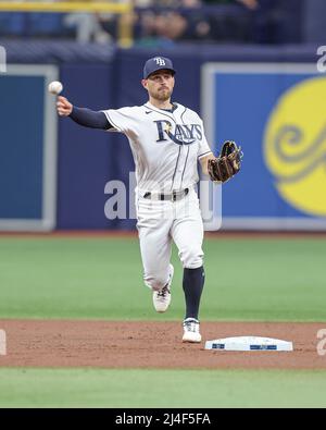 St. Petersburg, United States. 14th Apr, 2022. St. Petersburg, FL. USA;  Oakland Athletics center fielder Cristian Pache (20) and left fielder Chad  Pinder (10) chest bump during pregame warmups prior to a