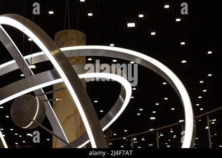 Abstract glowing modern architecture in shopping mall.  Stock Photo