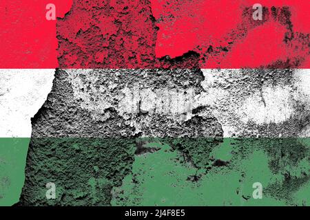 Hungary flag painted on a damaged old concrete wall surface Stock Photo