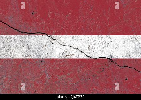 Latvia flag painted on a cracked old concrete wall Stock Photo