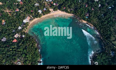 Aerial view of Hiriketiya Beach in Dikwella. Blue beach in Sri Lanka. Stock Photo