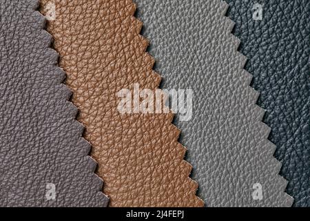Samples of beige, brown, gray black leather. Leather crafts and craftwork. View from above. Stock Photo