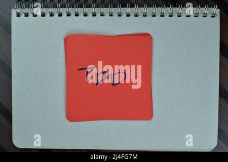 TDD write on sticky notes isolated on Wooden Table. Stock Photo