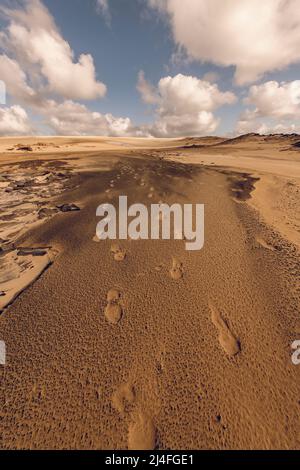 Footprints in sand dunes at the Wungul Sandblow, Fraser Island, Queensland, Australia Stock Photo