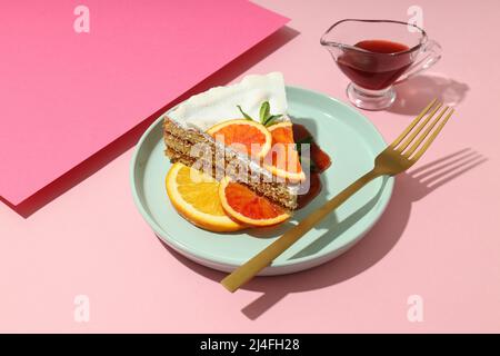 Concept of tasty food with pie with meringue on pink background Stock Photo