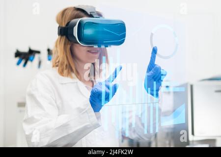 Scientist in lab coat and virtual reality VR goggle uses AR augmented reality for analysis of data. Metaverse NFT game concept.  Stock Photo