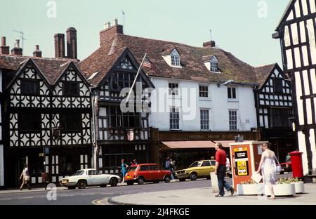 Historic buildings Tudor frontages,   High Street, Stratford on Avon, Warwickshire, England, UK 1982 incluidng Freeman Hardy Willis shop Stock Photo