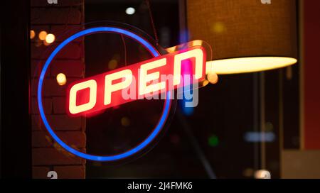Neon glowing sign open Stock Photo