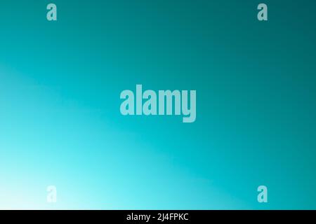 White to teal gradient with turquoise color abstract background photo. Turquoise sky gradient concept. Stock Photo