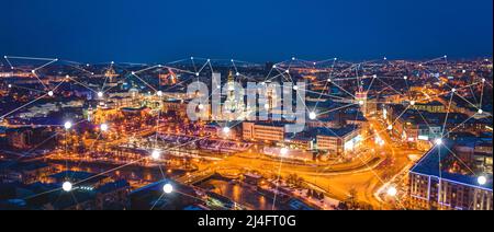 Concept of connection and next generation network 5G on the big night city background. Design of modern mobile and communication technologies. People Stock Photo