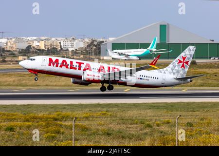 Malta Air Boeing 737-8 MAX 200 (REG: 9H-VUD) lifting off from runway 13 on its way to Milan, Italy. Stock Photo