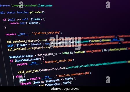 The software developer does the PHP coding. The programmer is doing web backend coding. With selective focus Stock Photo