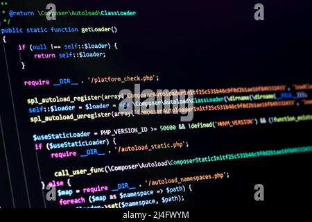 The software developer does the PHP coding. The programmer is doing web backend coding. With selective focus Stock Photo