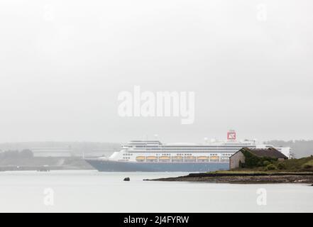 Roches Point, Cork, Ireland. 15th April, 2022. Cruise ships returned to Cobh for the first time in over two years with the arrival of the liner Borealis, seen here passing the oil refinery  in Cork Harbour,  Ireland.  - Credit; David Creedon / Alamy Live News Stock Photo