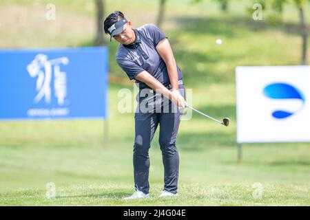 PATTAYA THAILAND - APRIL 15: Chang Wei-lun of Chinese Taipei plays a shot on the 13th hole during the third round of the Trust Golf Asian Mixed Stableford Challenge at Siam Country Club Waterside Course on April 15, 2022 in Pattaya, Thailand. (Photo by Orange Pictures/BSR Agency/Getty Images) Stock Photo