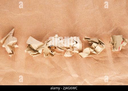 top view of crumpled paper balls on old paper  Stock Photo