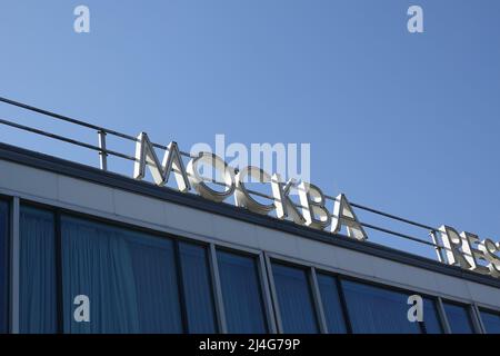 Berlin, Germany. 21st Mar, 2022. 'Mockba' (Moscow) is written in Cyrillic script on Cafe Moskau. Cafe Moskau is a listed building at the corner of Karl-Marx-Allee 34 and Schillingstraße in Berlin's Mitte district. In GDR times it contained a nationality restaurant with selected dishes of some peoples of the Soviet Union and was a popular meeting place. Credit: Alexandra Schuler/dpa/Alamy Live News Stock Photo