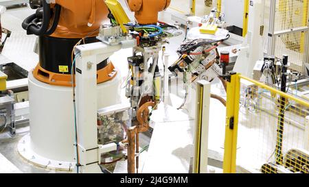 Argentina - Buenos Aires,12.11.2021: automatic robotic arm at work. Scene. Presentation of new technological robot in mechanical engineering. Stock Photo