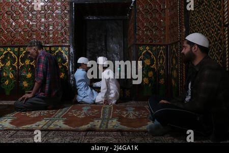 Srinagar, Kashmir, India. 15th Apr, 2022. Muslims seen praying at the shrine of Khanqah-e-Moula, also known as Shah-e-Hamadan R.A Mosque and Khanqah, during the holy month of Ramadhan in Srinagar, Indian-administered Kashmir. (Credit Image: © Adil Abbas/ZUMA Press Wire) Stock Photo