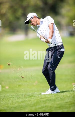 PATTAYA THAILAND - APRIL 14: Chang Wei-lun of Chinese Taipei plays a shot on the 10th hole during the second round of the Trust Golf Asian Mixed Stableford Challenge at Siam Country Club Waterside Course on April 14, 2022 in Pattaya, Thailand. (Photo by Orange Pictures) Stock Photo