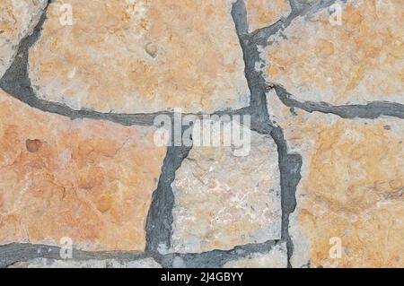 Stone wall close-up. Background image Stock Photo