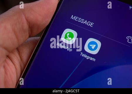 WhatsApp and Telegram application icons on smartphone screen. Popular messaging apps. Afyonkarahisar, Turkey - April 15, 2022. Stock Photo