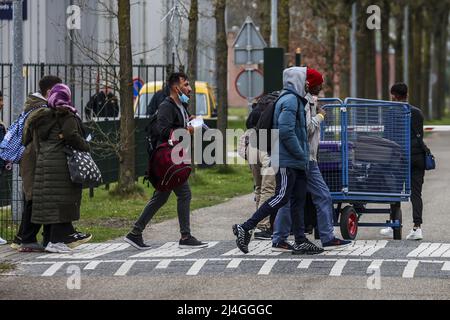 Ter Apel, Netherlands. 15th Apr 2022. 2022-04-15 13:47:27 TER APEL - Asylum seekers arrive at the Ter Apel application center. According to the state secretary, the reception of asylum seekers must 'really improve'. ANP VINCENT JANNINK netherlands out - belgium out Credit: ANP/Alamy Live News Stock Photo