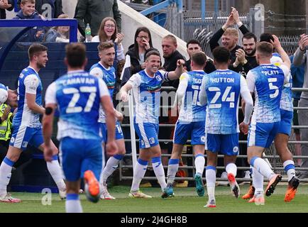 Barrow's John Rooney (centre) celebrates scoring their side's second goal of the game during the Sky Bet League Two match at The Dunes Hotel Stadium, Barrow-in-Furness. Picture date: Friday April 15, 2022. Stock Photo