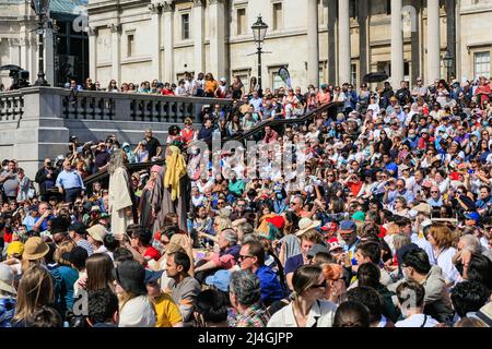Trafalgar Square, London, UK. 15th Apr, 2022. Jesus walks through the crowd. The annual 'Passion of Jesus' play sees around a hundred Wintershall players bring their portrayal of the final days of Jesus to on Trafalgar Square for the Christian Good Friday holiday. The beautiful sunny weather means the square is packed with spectators. Credit: Imageplotter/Alamy Live News Stock Photo
