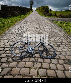 Ribble Cycles road bike on a cobbled road, Lancashire, UK. Stock Photo