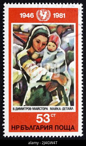 BULGARIA - CIRCA 1982: a stamp printed in the Bulgaria shows Mother and Child, Painting by Vladimir Dimitrov, circa 1982 Stock Photo