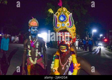 April 12, 2022, bardhaman, India: Devotees seen with painted faces during the Gajan festival at kurmun. Gajan is a Hindu festival celebrated mostly in West Bengal as well as southern part of Bangladesh during the end of the month of Ã¬ChaitraÃ® of the Bengali calendar followed by another festival named Ã¬CharakÃ®. This festival is mainly worshipping Hindu Lord Shiva and Parvati before the start of the harvesting season. Gajan is actually connected to the people who are related to the agricultural community, directly or indirectly. People celebrate by performing rituals such as face painting Stock Photo