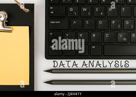 Conceptual caption Data Analysis. Internet Concept Translate numbers to Analytical Conclusion Forecasting Computer Keyboard And Symbol.Information Stock Photo
