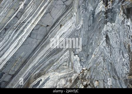 Cut of natural Karelian marble Stock Photo