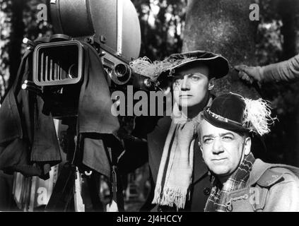 errol flynn, milton krims, on the set of the movie crossed swords, 1953  Stock Photo - Alamy