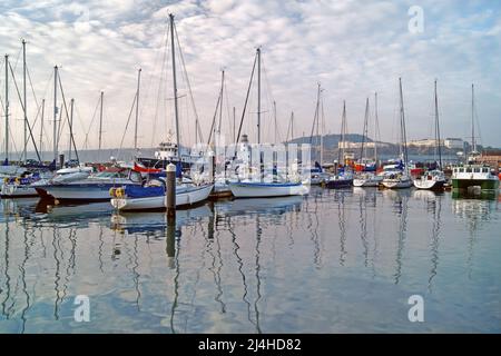 UK, North Yorkshire, Scarborough Harbour and Marina looking towards Lighthouse with the Olivers Mount in the Distance. Stock Photo