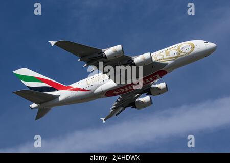 An Airbus A380 operated by Emirates, wearing a special livery for the 50th Anniversary of the UAE departs from London Heathrow Airport Stock Photo