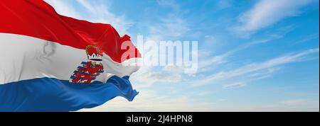 official flag of Unofficial province of Luxembourg, Belgium at cloudy sky background on sunset, panoramic view. Belgian travel and patriot concept. co Stock Photo