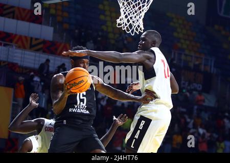 Cairo, Egypt. 15th Apr, 2022. Khaman Maluach (R) of Cobra Sport blocks a shot of Jamel Artis of Cape Town Tigers during the match between Cobra Sport of South Sudan and Cape Town Tigers of South Africa at the 2022 Basketball Africa League (BAL) in Cairo, Egypt, April 15, 2022. Credit: Ahmed Gomaa/Xinhua/Alamy Live News Stock Photo