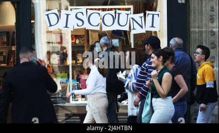 Paris, France. 15th Apr, 2022. People walk past a bookshop in Paris, France, April 15, 2022. France's Consumer Price Index (CPI) increased by 4.5 percent in March on an annual basis, reaching its highest since December 1985, statistics from the French National Institute of Statistics and Economics Studies (INSEE) showed on Friday. Credit: Gao Jing/Xinhua/Alamy Live News Stock Photo