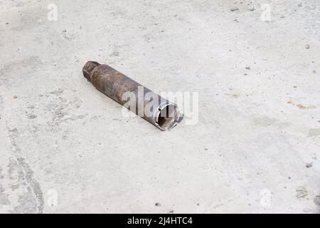 a tubular drill for drilling large holes in concrete lies on a monolithic ceiling, selective focus Stock Photo