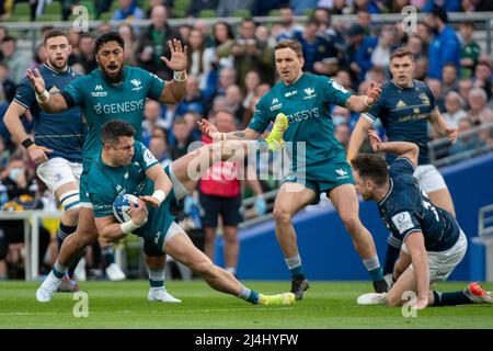 Dublin, Ireland. 16th Apr, 2022. Tiernan O'Halloran of Connacht fouled by Hugo Keenan of Leinster during Heineken Champions Cup, Round of 16, 2nd leg match between Leinster Rugby and Connacht Rugby at Aviva Stadium in Dublin, Ireland on April 15, 2022 (Photo by Andrew SURMA/ Credit: Sipa USA/Alamy Live News Stock Photo