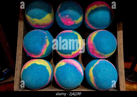 Skin care product of bath salts water fragrance balls on display at a beauty shop Stock Photo