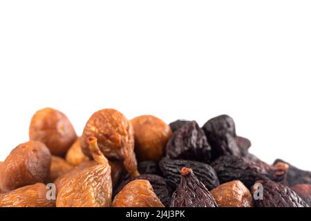 Two Varieties of Dried Figs Isolated on a White Background Stock Photo