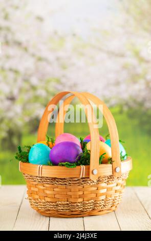 Basket Full of Colorful Solid Boiled Easter Eggs Stock Photo